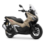 Honda ADV scooter in beige and black with a tall windscreen, side view